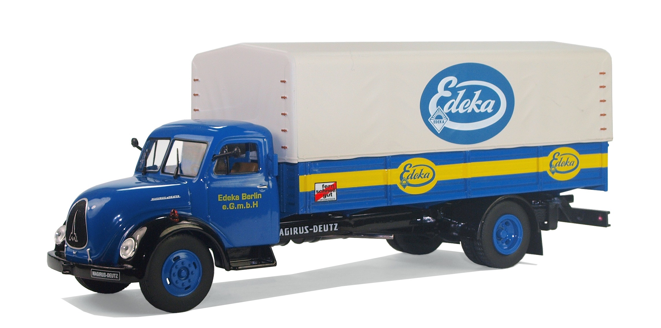 blue, white, and yellow Edeka boax truck toy