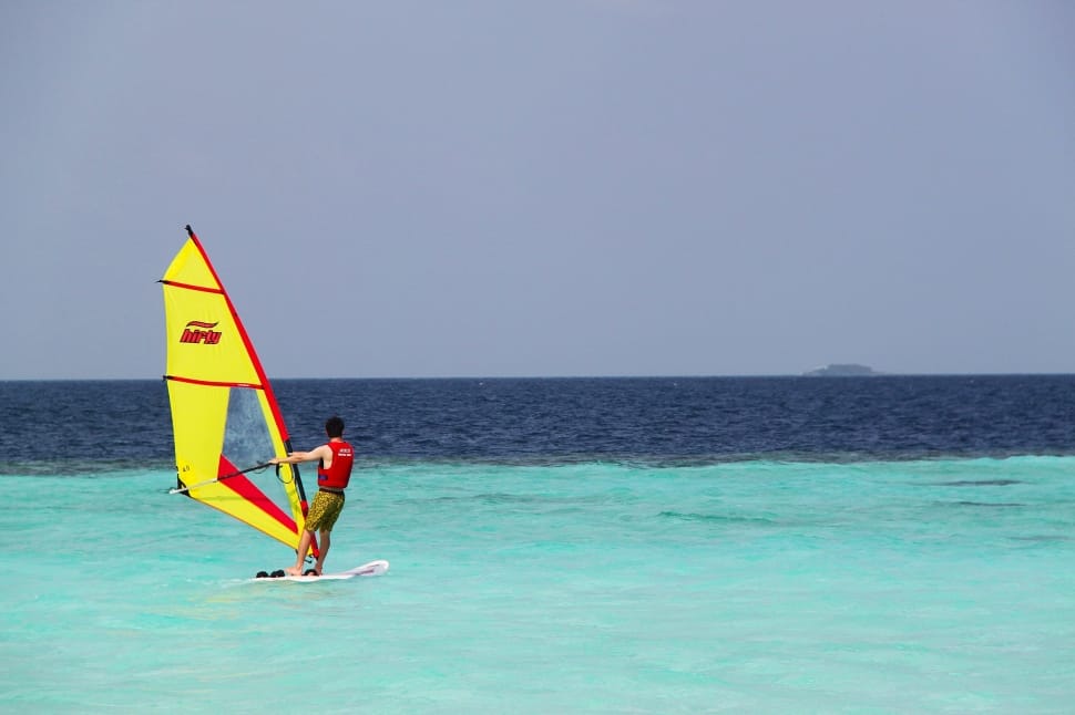yellow and red sail boat preview