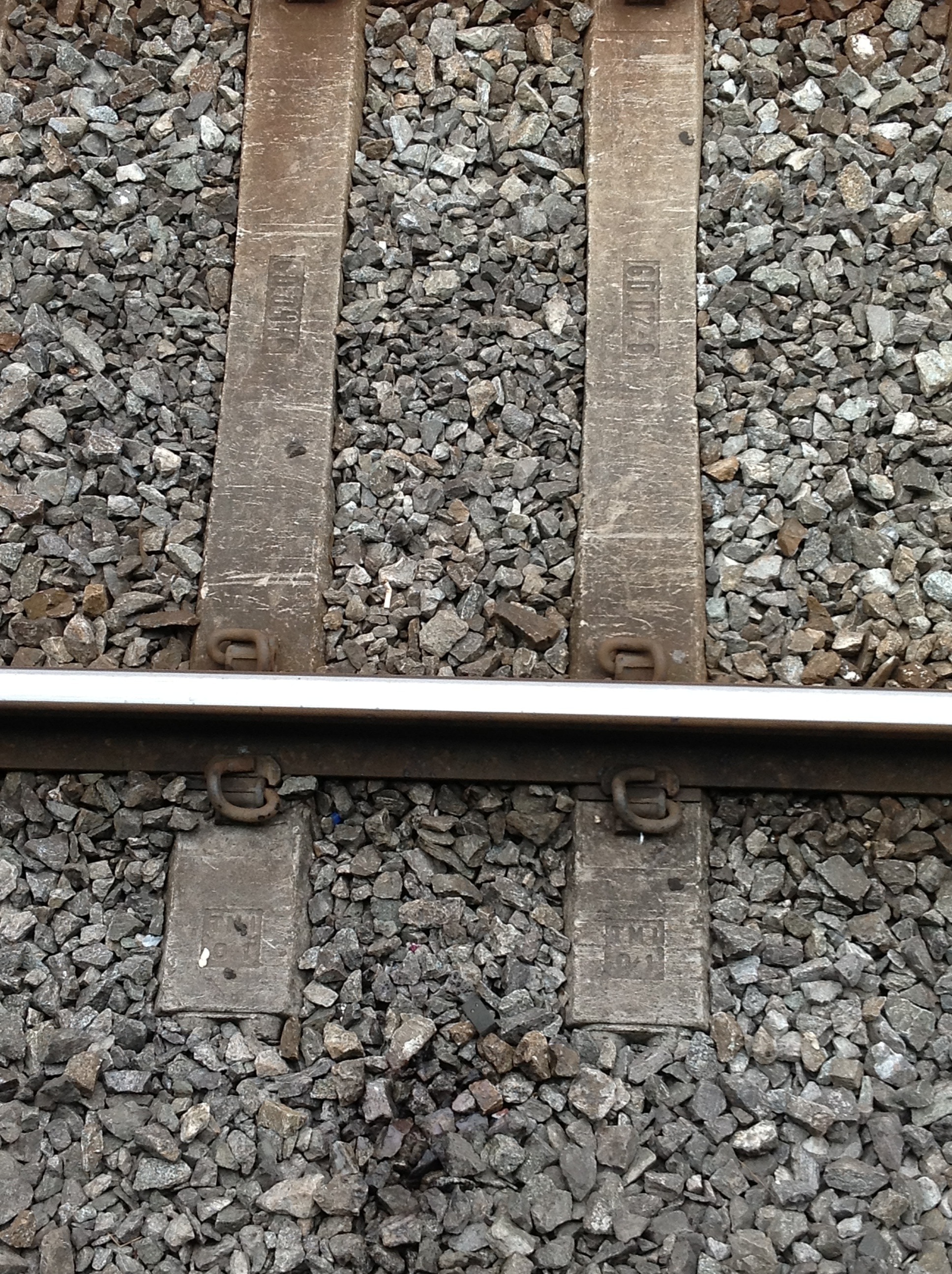gray stone and railway