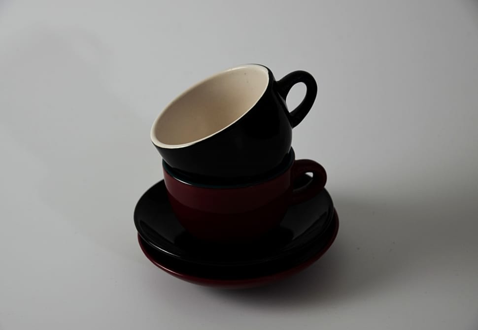 2 brown ceramic cups with saucers preview