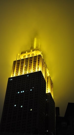 yellow and black high rise building thumbnail