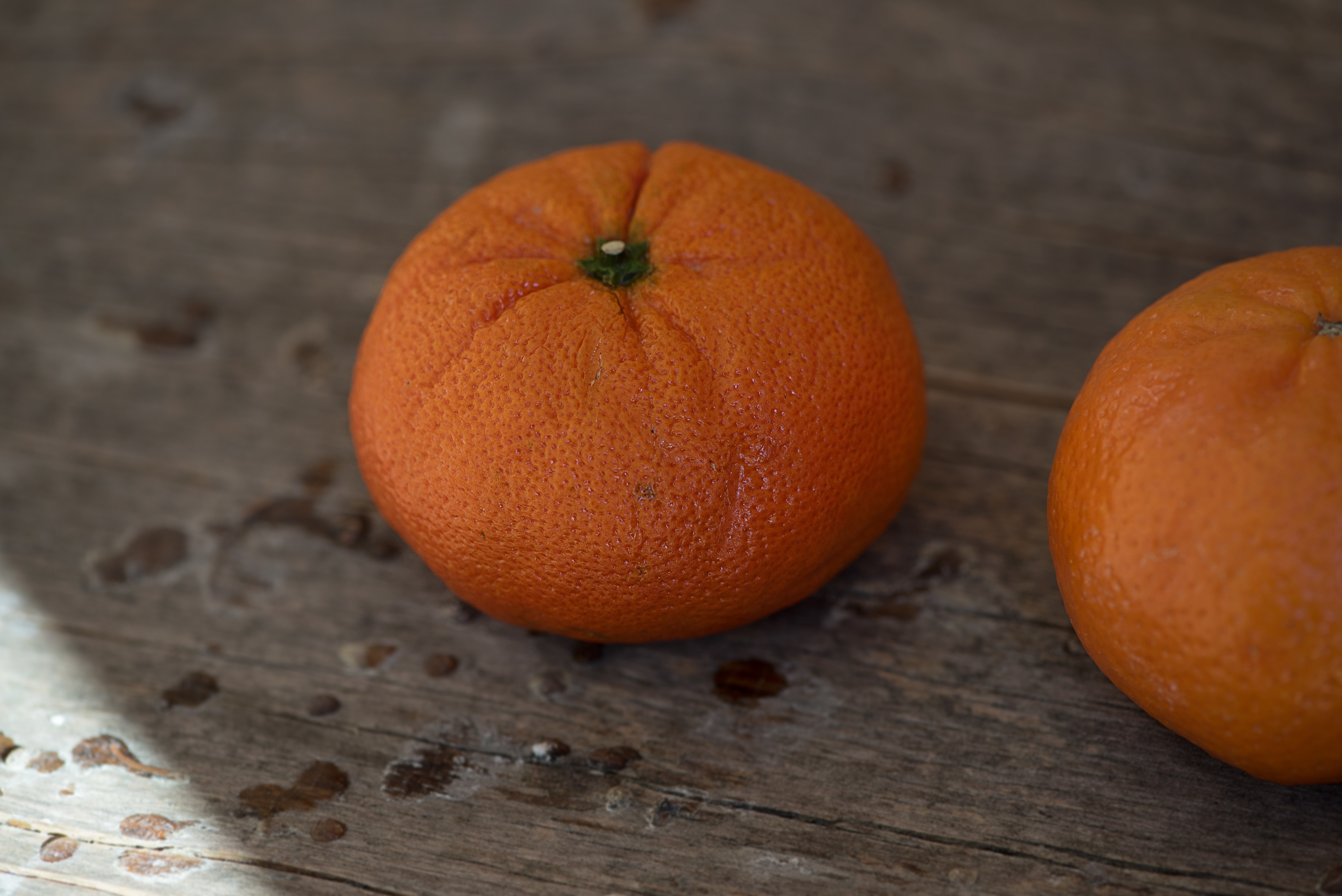 2 orange tangerine fruits