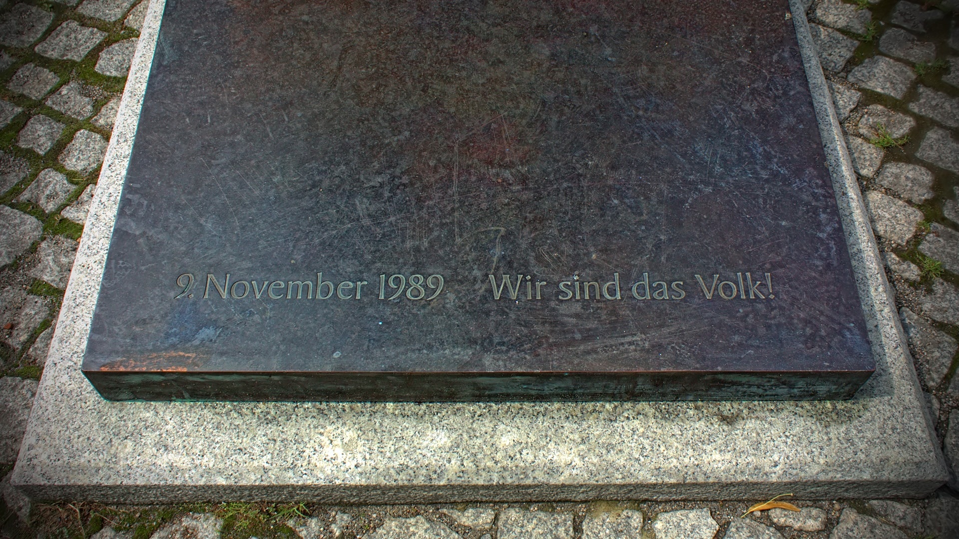 black 9 novemver 1989 wir sind das volk concrete pavement