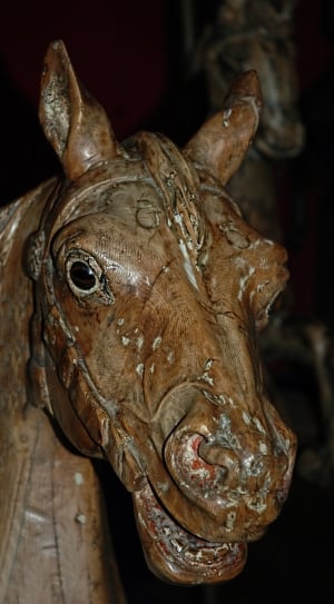 close up photo of brown horse figurine thumbnail