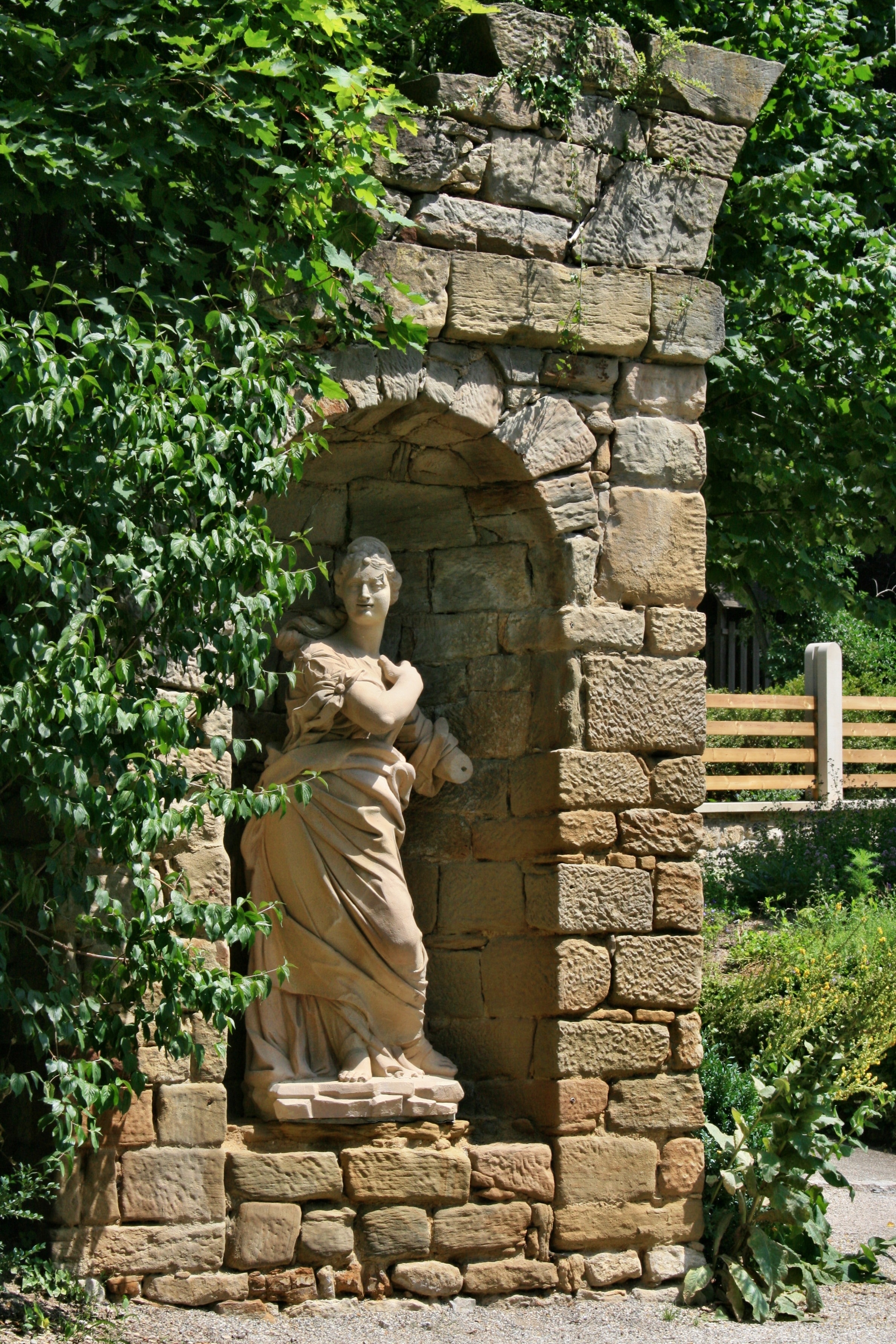 female concrete statue