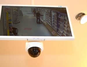 flat screen tv and dome security camera thumbnail