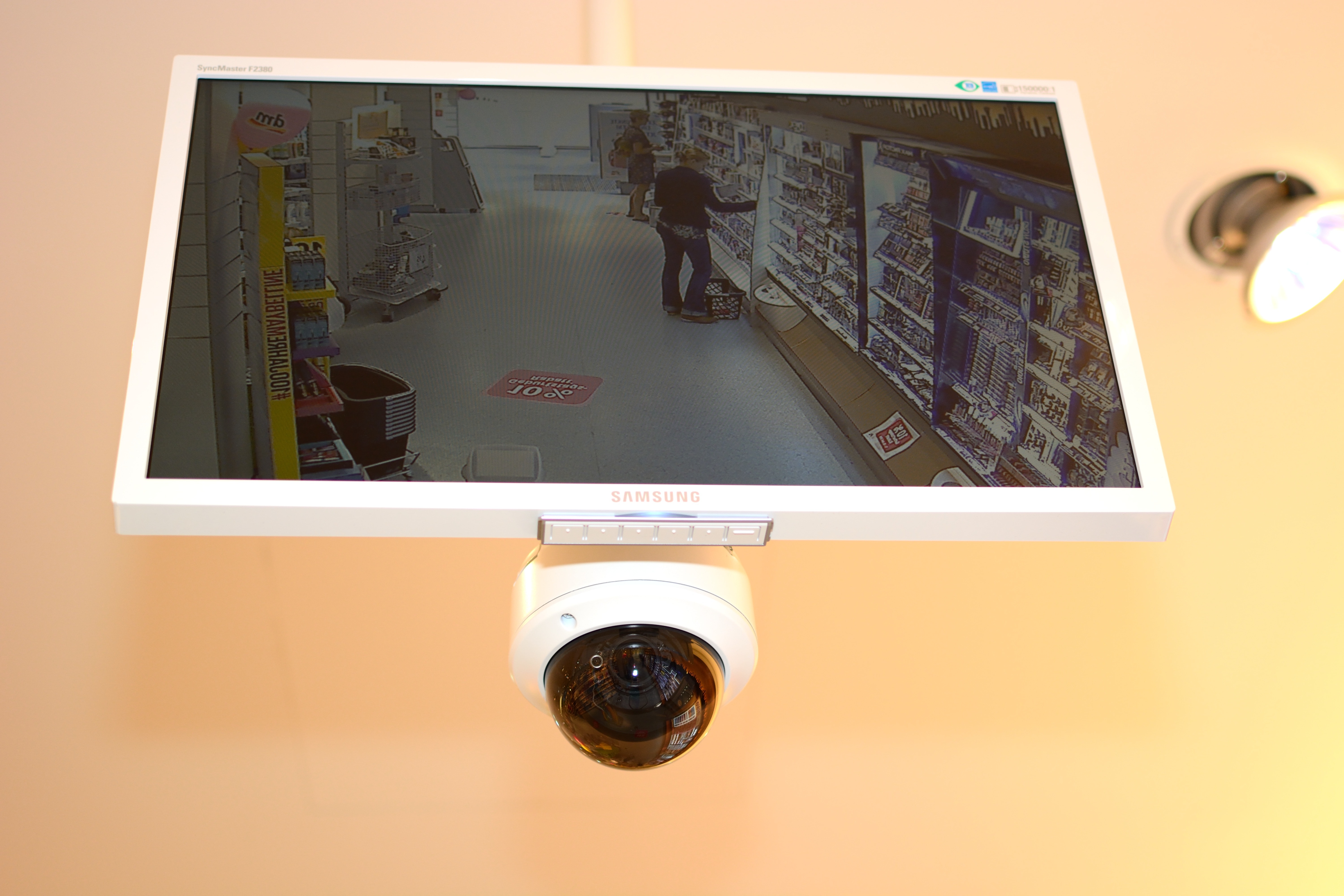 flat screen tv and dome security camera