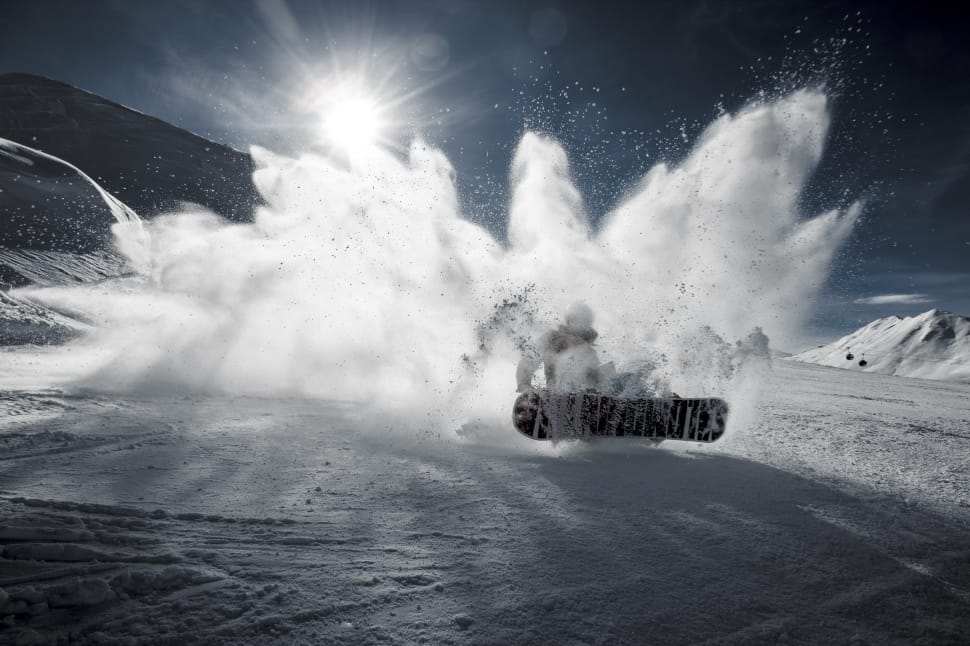person snowboarding on white snowy surface preview