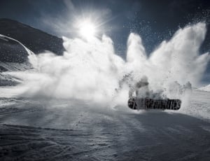 person snowboarding on white snowy surface thumbnail
