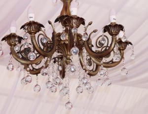 brass metal uplight chandelier with crystals thumbnail