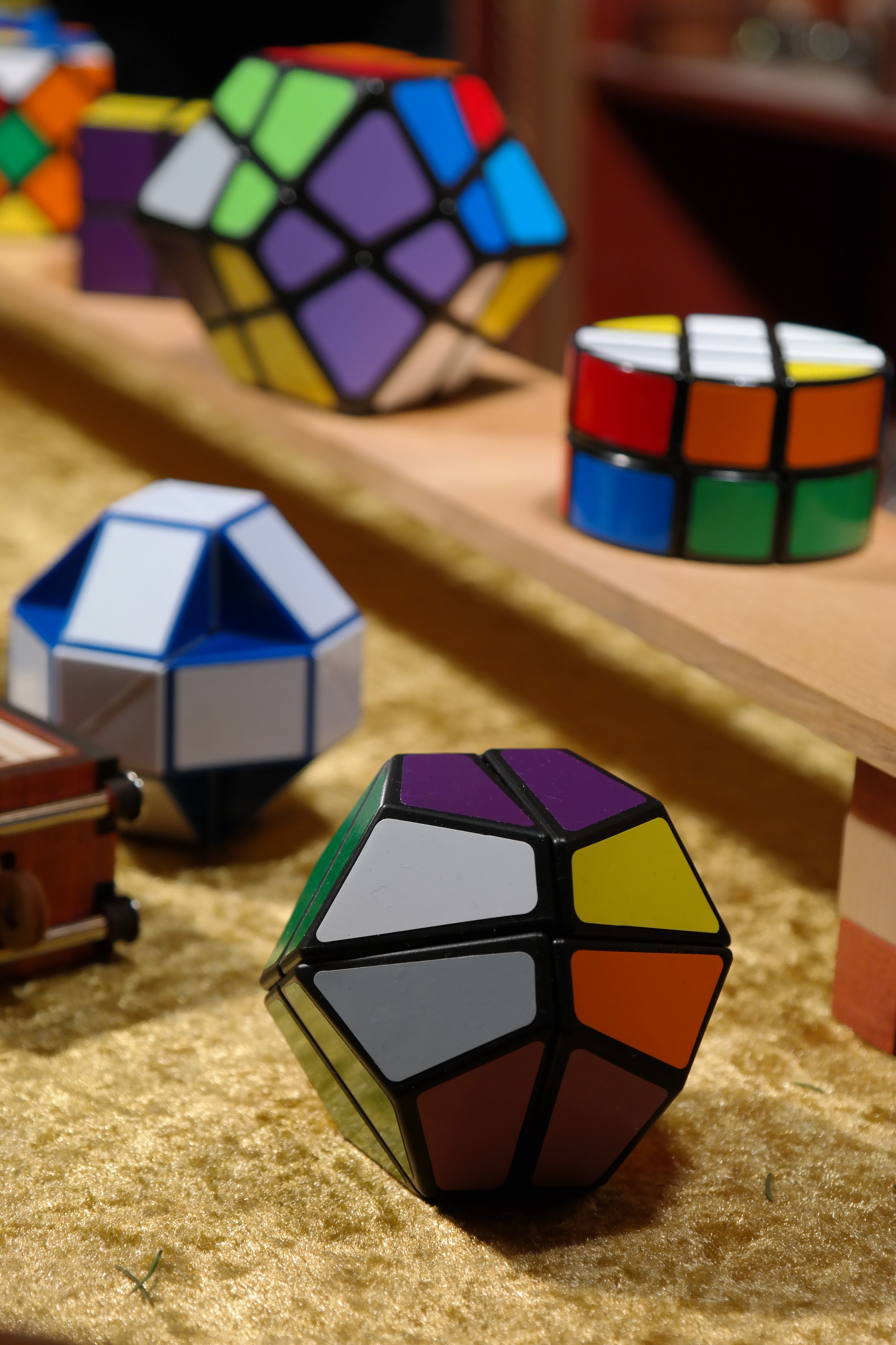 shallow focus photography of assorted rubik's cube