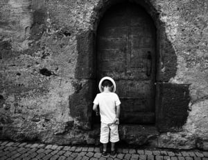child infront of door thumbnail