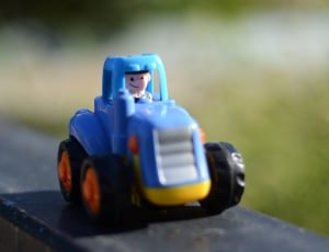 blue tractor toy thumbnail