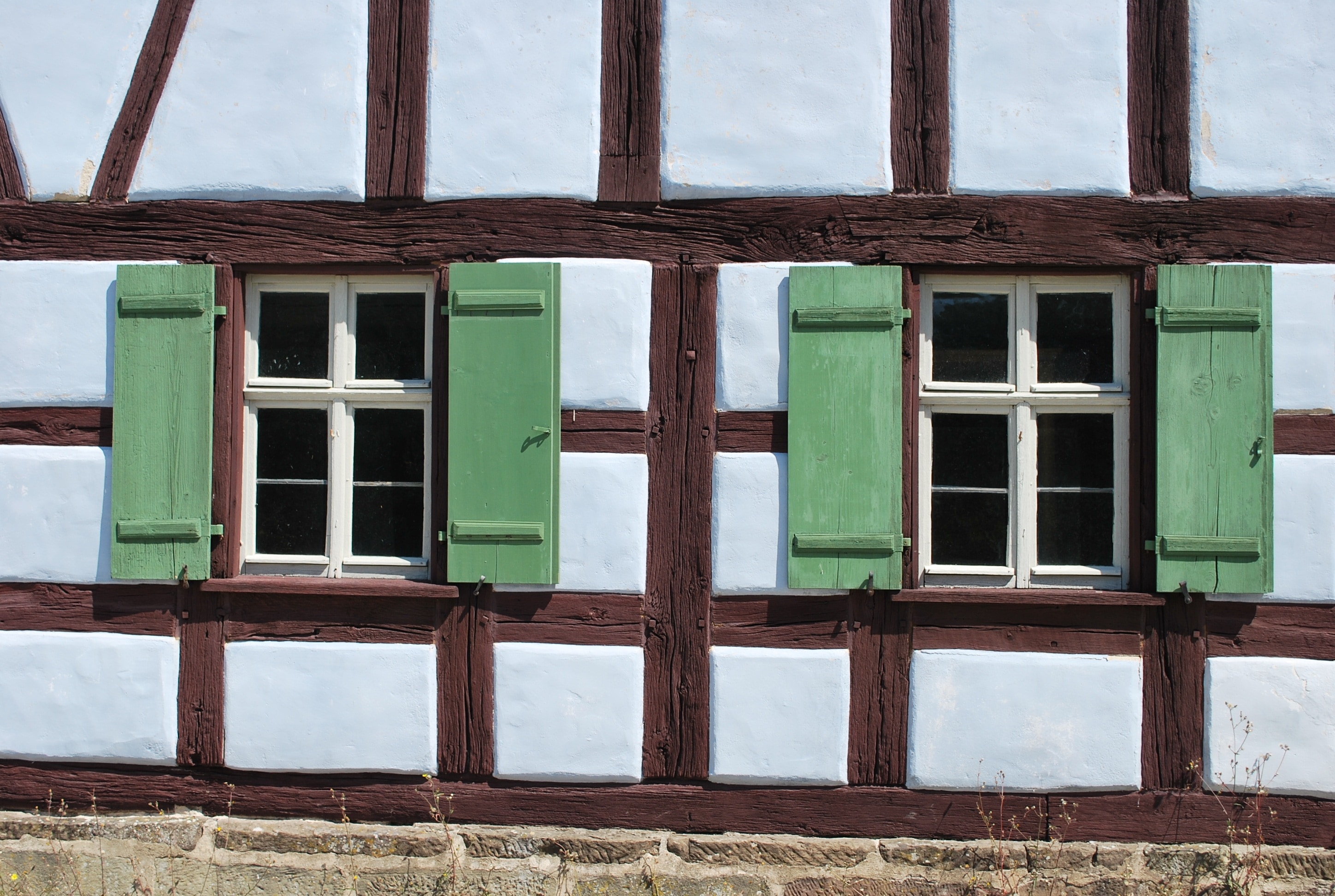 brown and green wooden window frames
