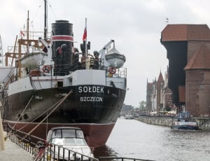 brown black and white cargo ship thumbnail