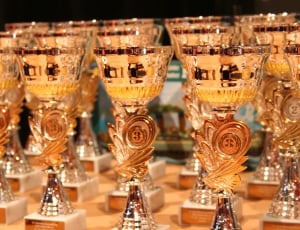 brass wine glasses with floral accents thumbnail