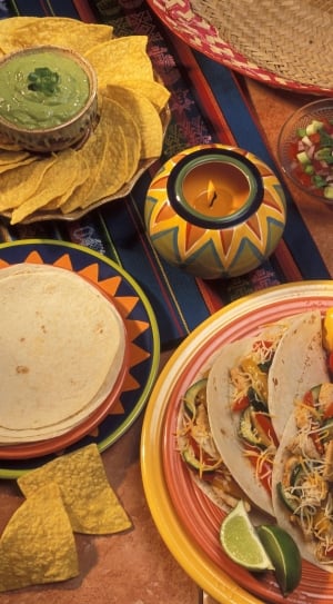 tacos on yellow and red ceramic round plaet thumbnail