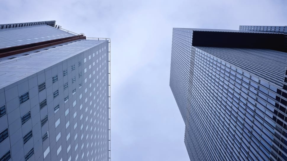low angle photography of 2 glass building preview