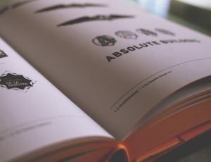 white and black logos print book pages thumbnail
