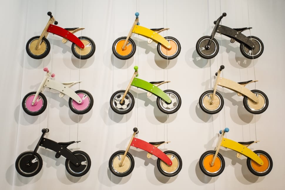 assorted wooden balance bikes preview