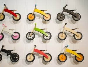 assorted wooden balance bikes thumbnail