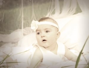 baby's white headband and sleeveless dress thumbnail