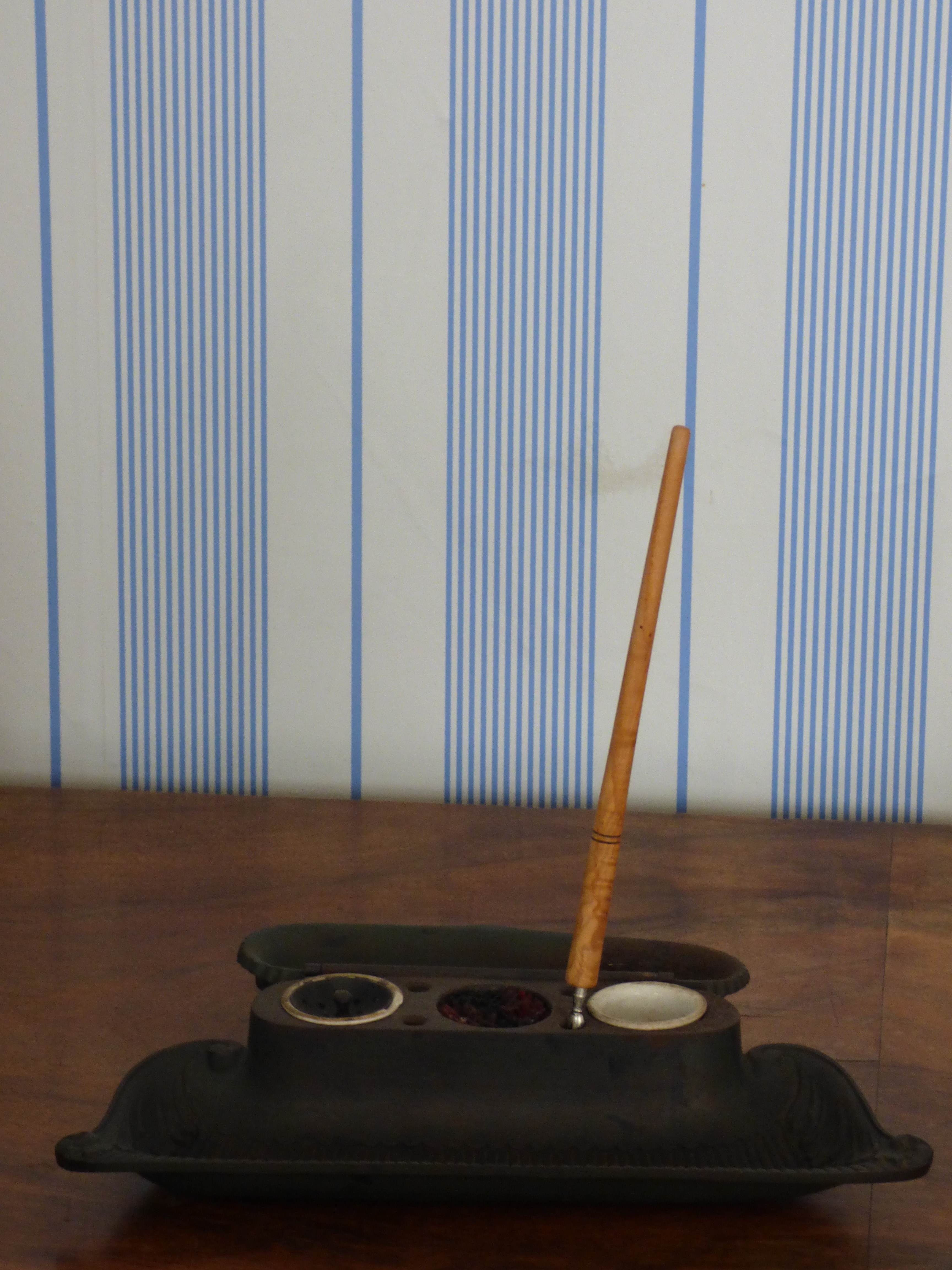 brown stick on black container