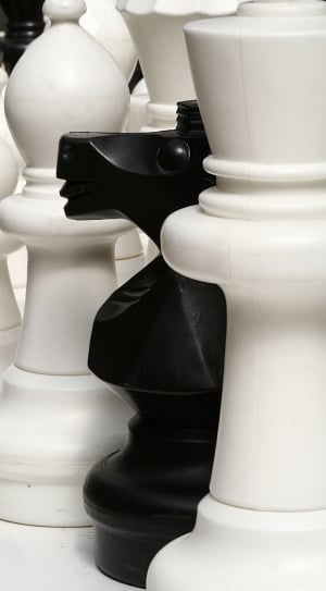 white and black chess chips thumbnail