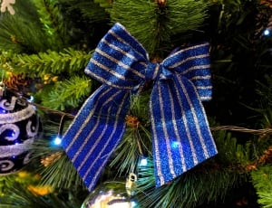 blue and silver ribbon on christmas tree thumbnail