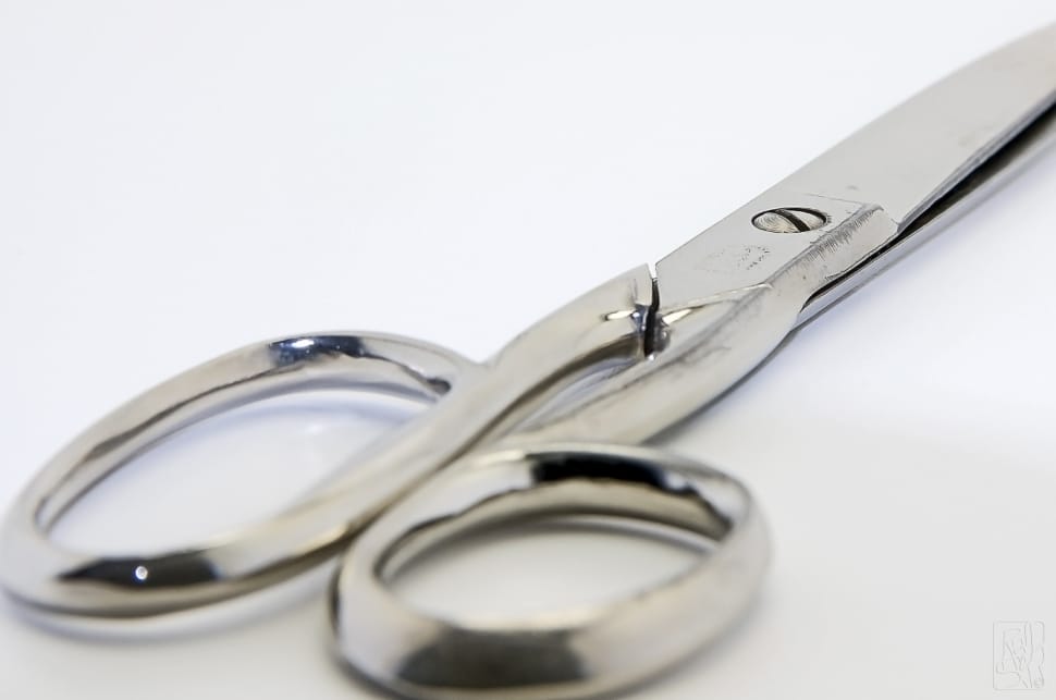 stainless steel Scissor on white surface preview