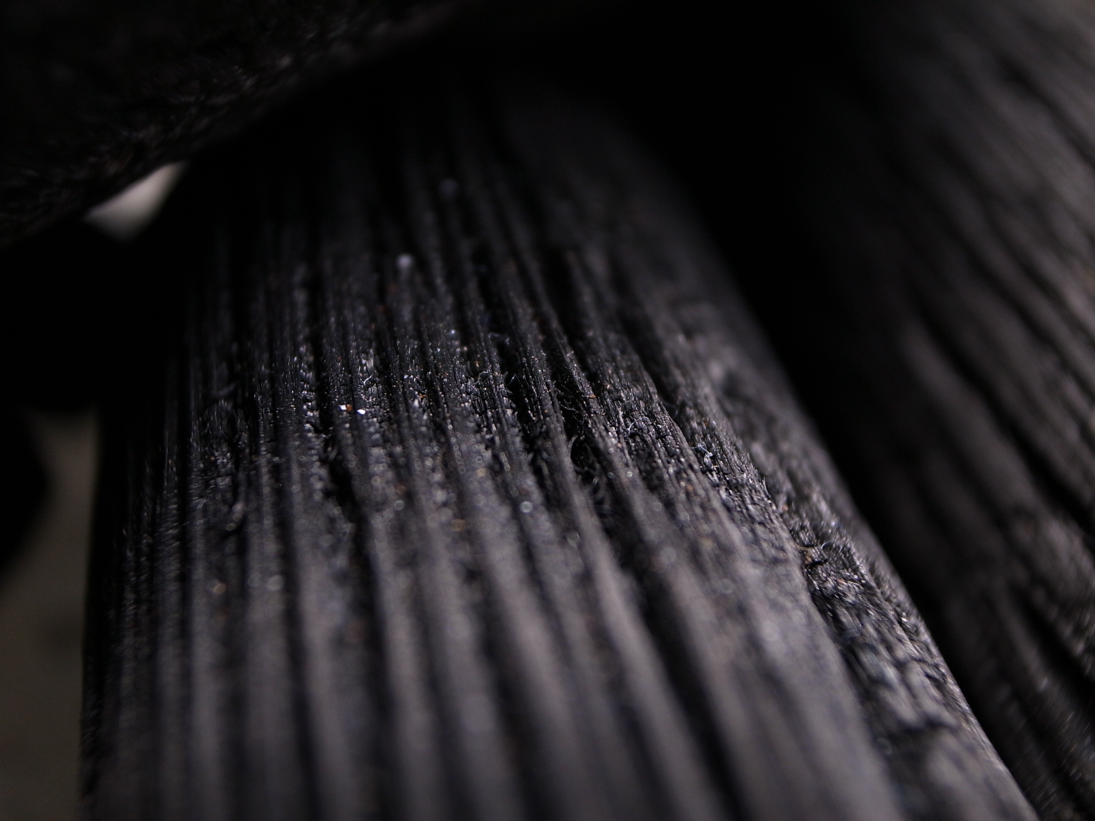 close up photo of black wood surface