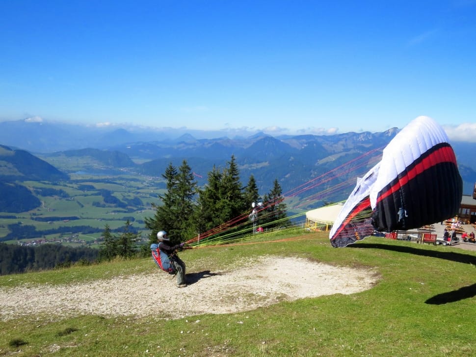 white red and black paragliding preview