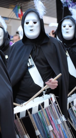 person playing a drum at the parade thumbnail