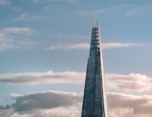 Low Angle View of Tower Against Cloudy Sky thumbnail
