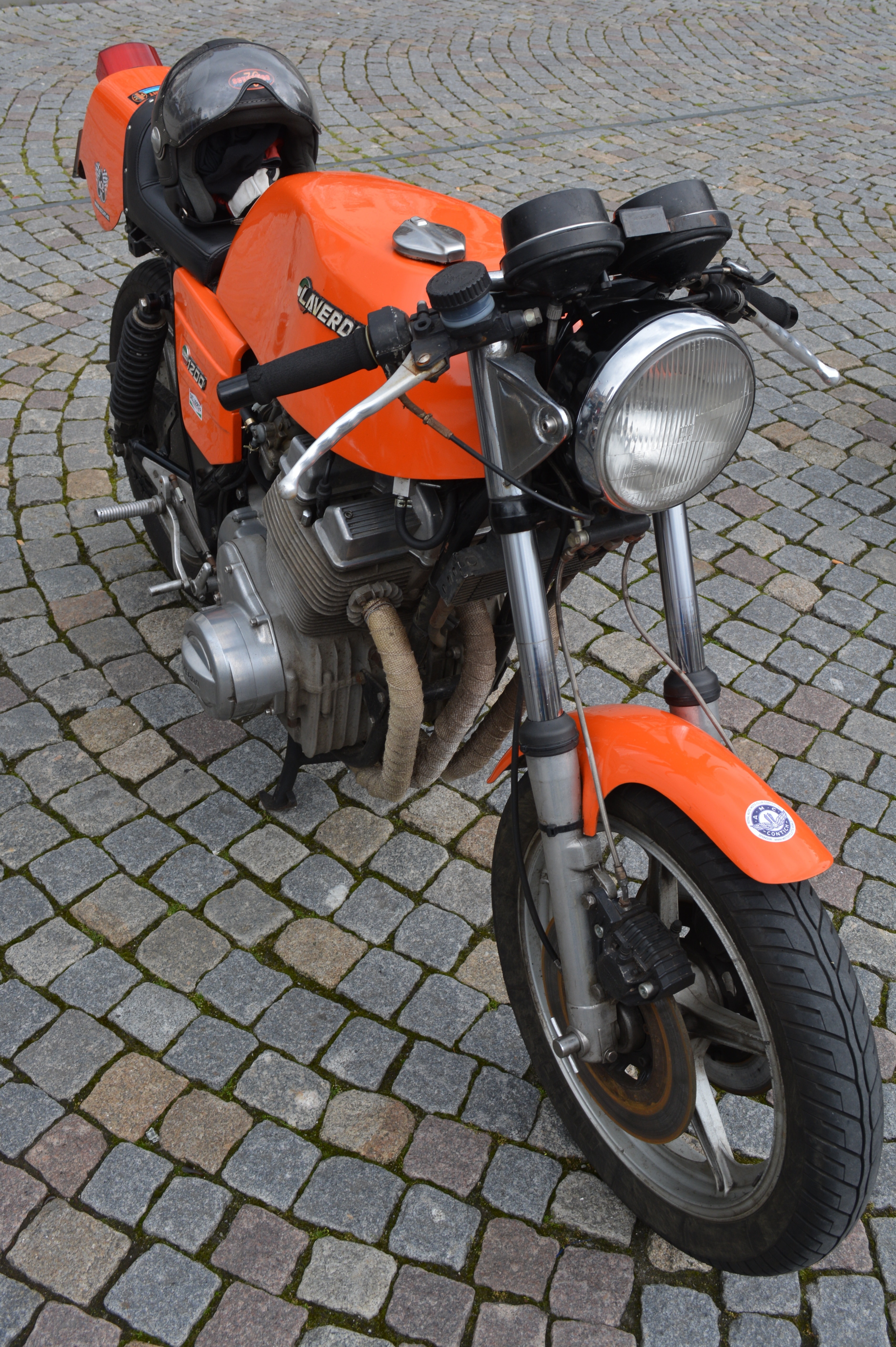 orange and black standard motorcycle