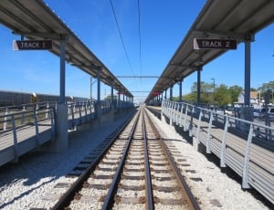 gray railings; train railway thumbnail