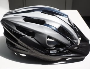 black and gray uvex cycling helemt thumbnail