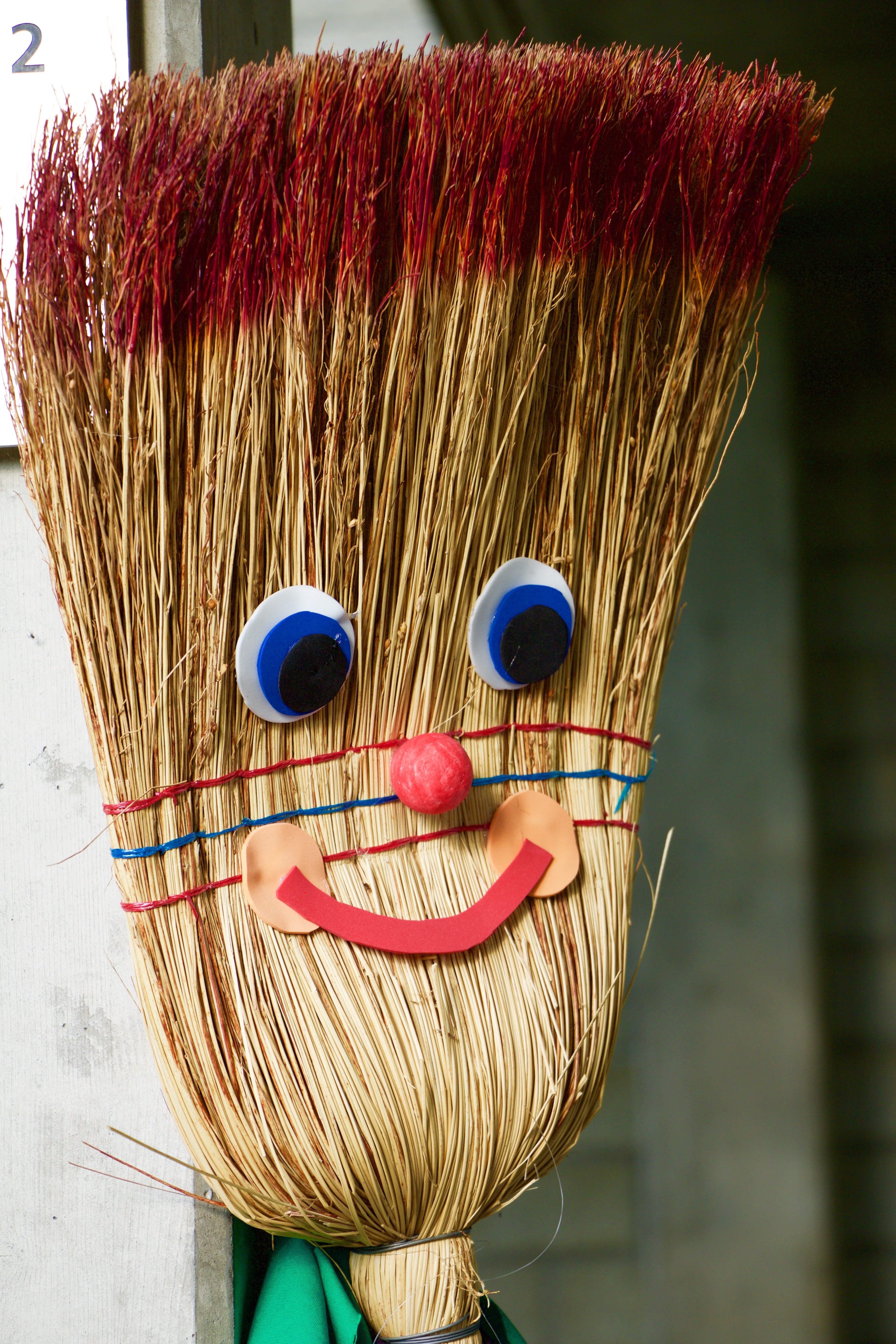 brown and red smiley soft broom