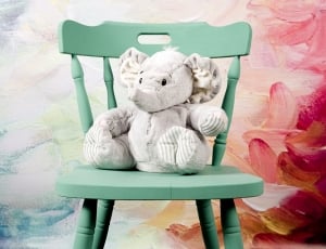 grey elephant plush toy and green windsor chair thumbnail