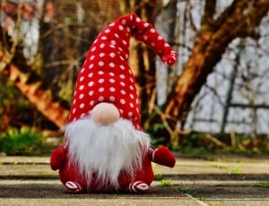 gnome with red hat plush toy thumbnail