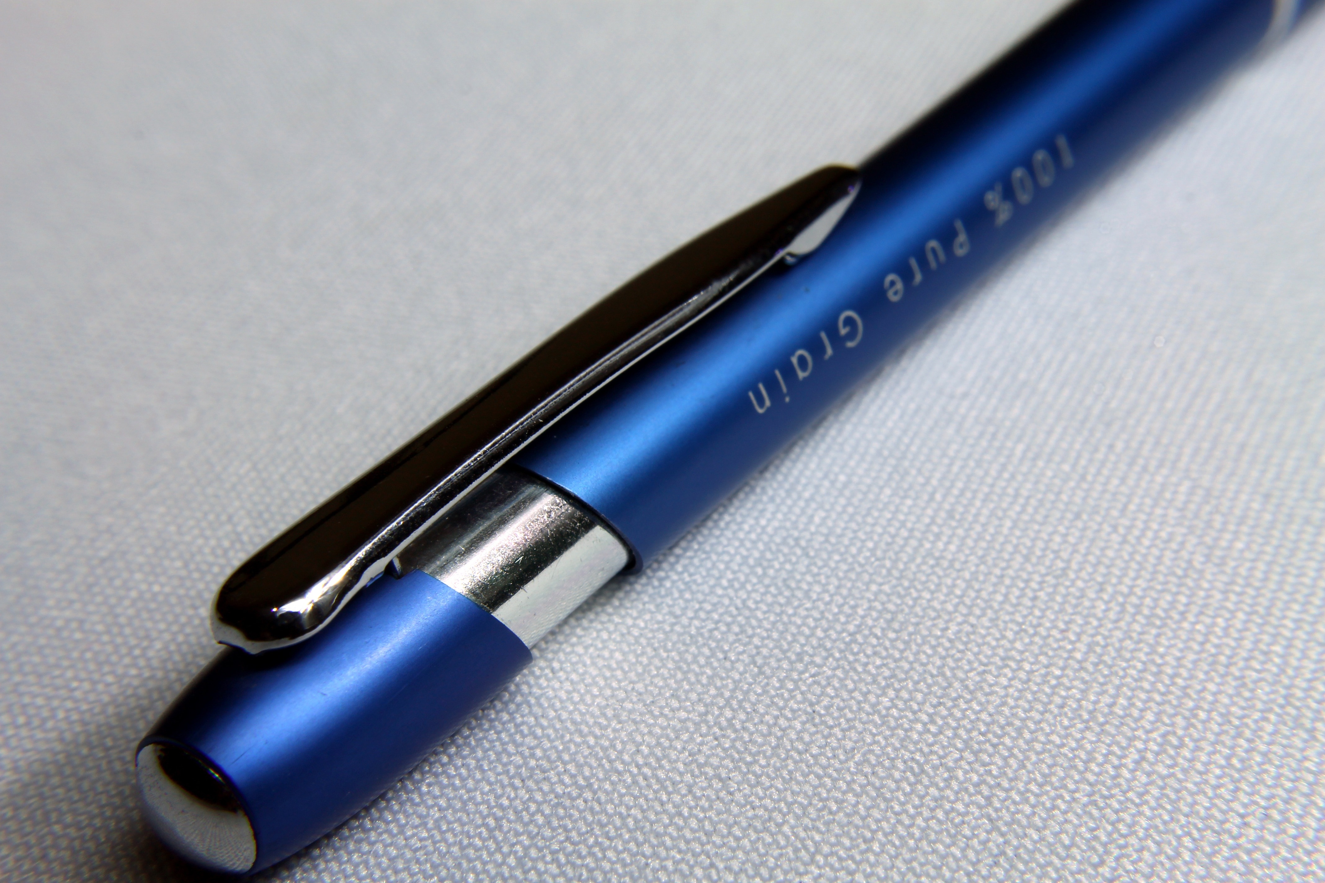 blue and grey click pen