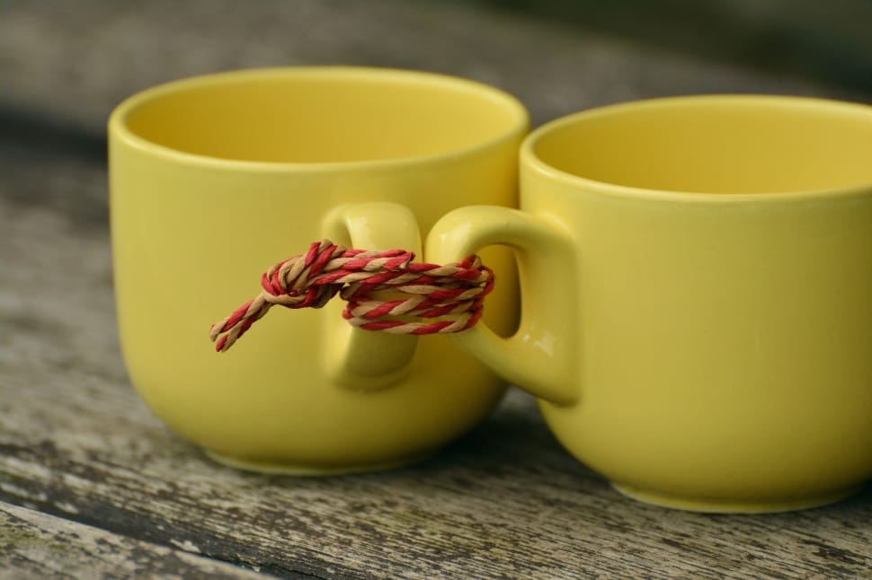 2 yellow ceramic mugs preview