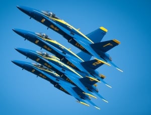 4 blue and white jet fighters thumbnail