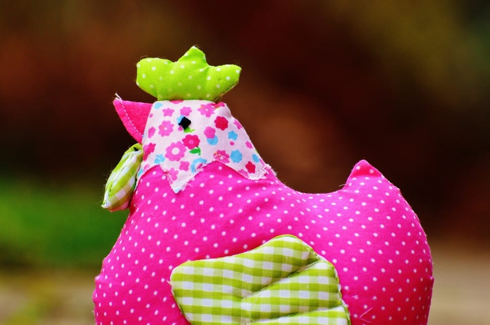 pink and green rooster plush toy preview