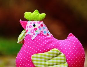 pink and green rooster plush toy thumbnail