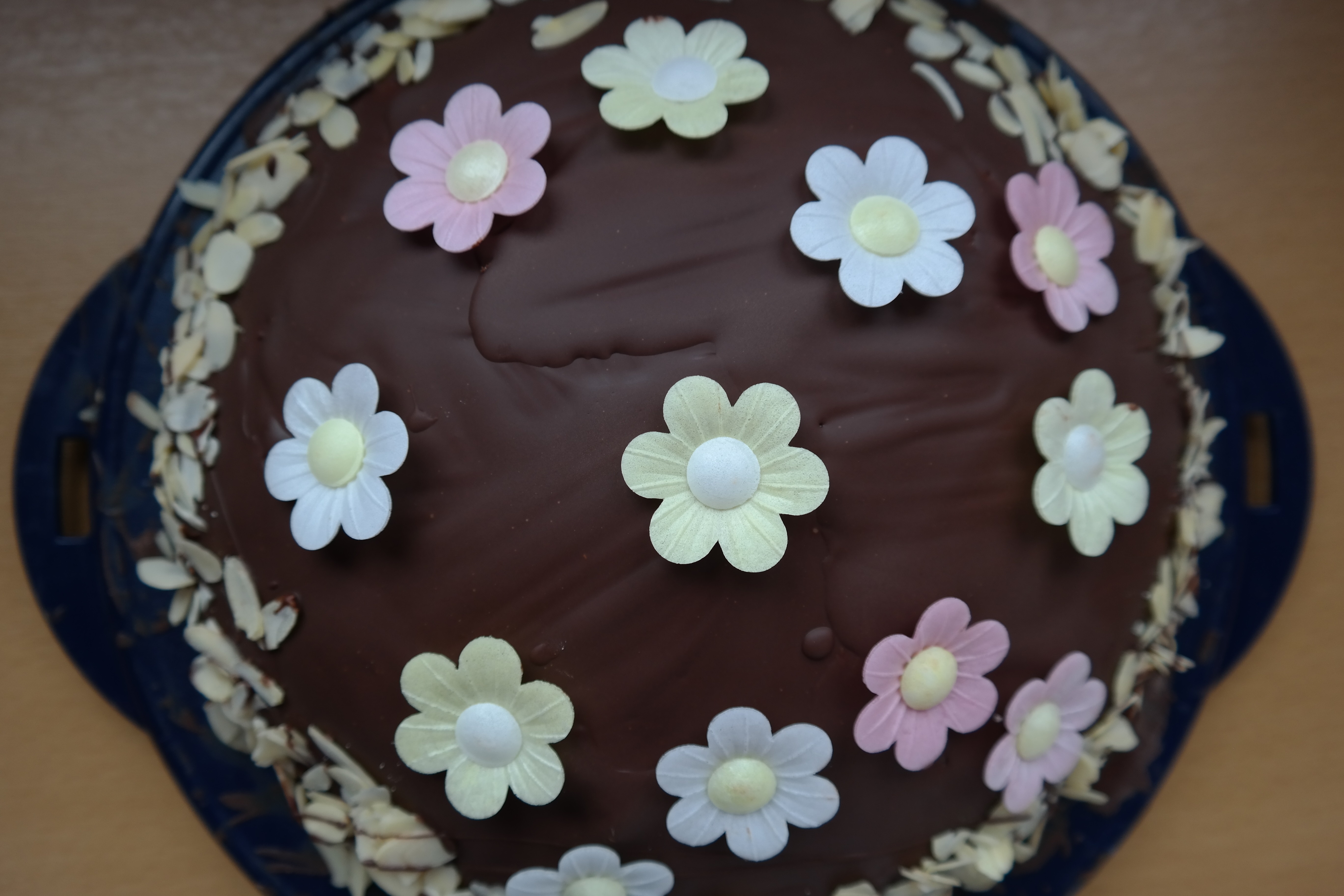 brown and white floral fondant cake