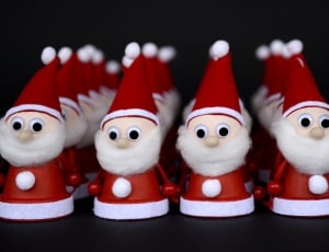 red white and beige santa clause figurine set thumbnail