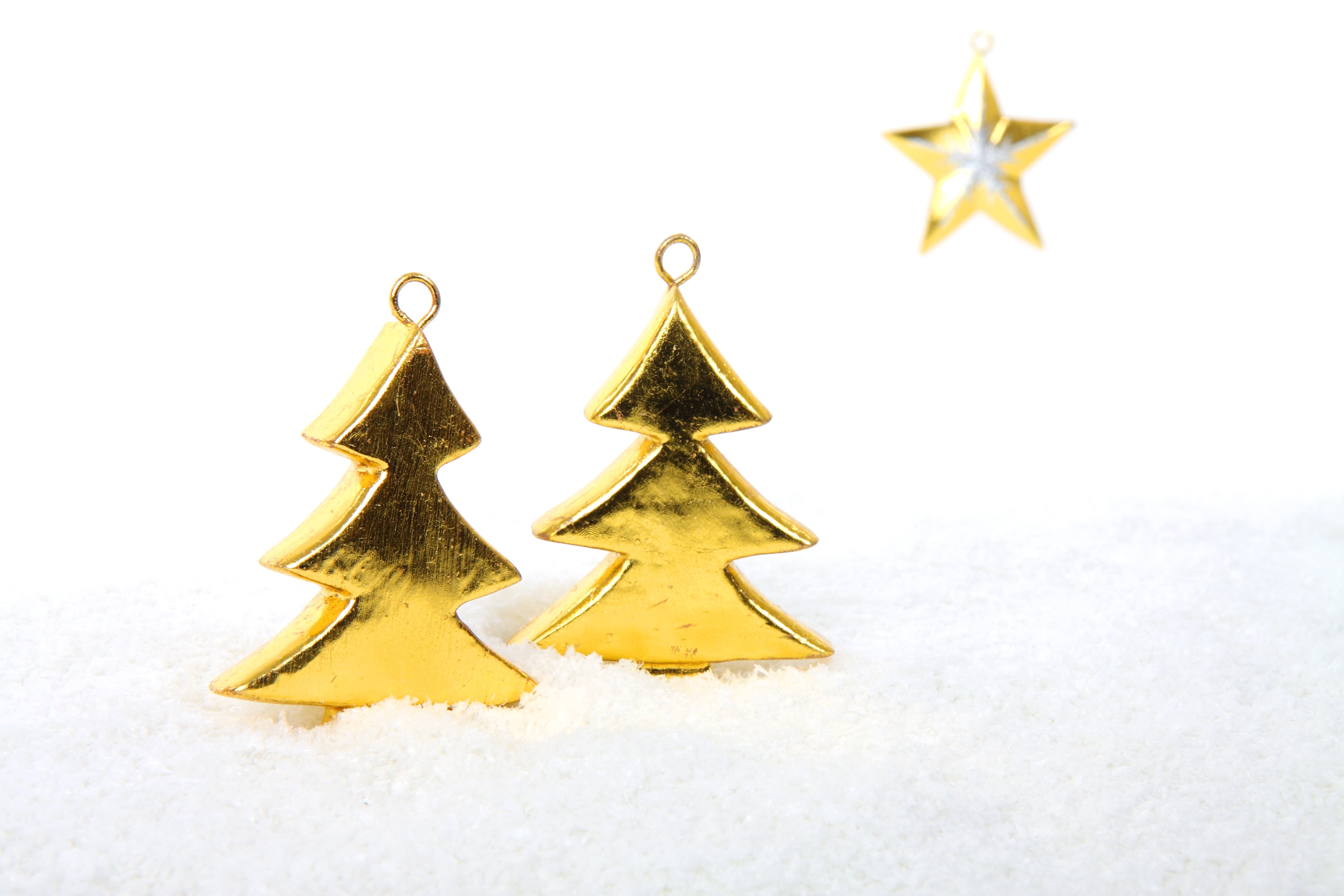 two gold christmas tree pendants