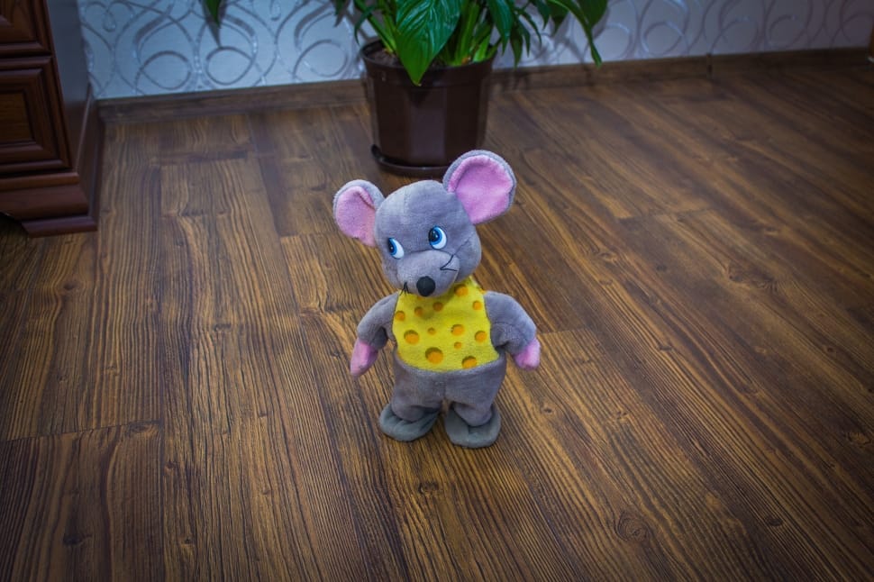 gray and yellow rat plush toy preview