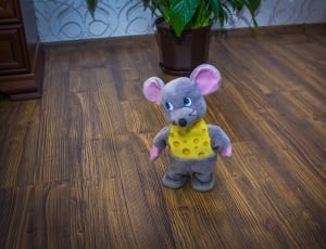 gray and yellow rat plush toy thumbnail